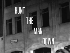 title card: HUNT THE MAN DOWN superimposed on a street scene (recreated by Richard McGinlay)