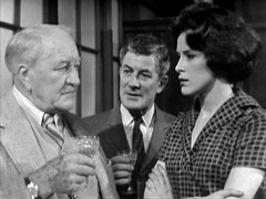 The Brigadier confers with Young and Miss Ellis