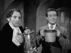Willy Frant fills Steed’s quart tankard from the pewter jug