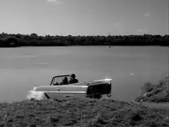 Steed and Emma drive into the loch in their Amphicar