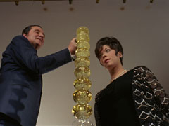 Low-angle view as Tara and Steed celebrate with a champagne fountain