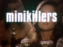 title card : ‘minikillers’ superimposed on a close-up of Diana in the audience of the flamenco show