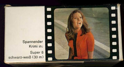 Side of box: Photo of Diana Rigg and the text ‘Spannender Krimi in: Super 8 schwarz-weiß (30 m)’