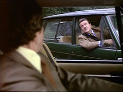 Steed leans out of his Range Rover to speak to Gambit - they’ve both arrive at tthe same time with the same cargo