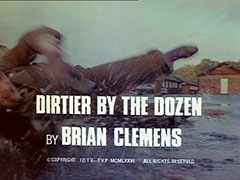 title card: white all caps text reading ‘DIRTIER BY THE DOZEN BY BRIAN CLEMENS’ superimposed on Captain Noble falling in a puddle on the tarmac as he is shot at