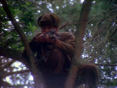 The lone Russian sniper takes aim from his tree-top perch