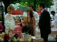 The Avengers meet at a café in Paris, Gambit has brought along Dsse Leparge, who is in a leopard print dress and is clearly his date, his hands resting on her shoulders