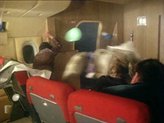 The New Avengers struggle to keeps their seats after the pilot opens the door and leaps out