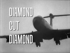 title card: DIAMOND CUT DIAMOND superimposed on an airliner coming in to land (recreated by Richard McGinlay)