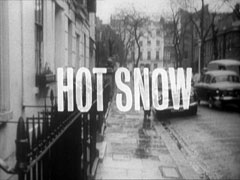 title card : HOT SNOW superimposed on a view up a quiet, rain-swept street in Chelsea