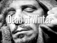 title card: Dead of Winter superimposed on the frozen face of Schneider inside the hessian sack