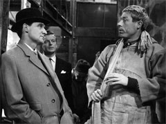 publicity still: Steed questions Harry about the unloading of the meat consignment as Weber looks on
