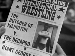 Close-up of the wrestling programme for the night: The Butcher of Islington v. The Decapod