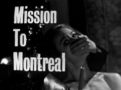 title card: white text reading ‘Mission To Montreal’ superimposed on the actor putting his hand over Carla’s mouth