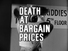 title card: white all caps text reading 'DEATH AT BARGAIN PRICES' outlined in black superimposed on an inflatable Yogi Bear