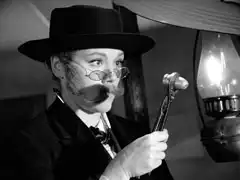 Steed’s surreal dream sequence: Mrs. Peel plays an Old West doctor, extracting an enormous bullet from his wound