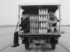 Steed and Mrs. Peel suddenly realise no-one is driving the milk float