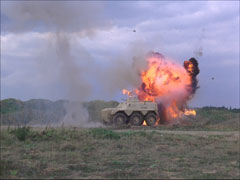 The Saracen armoured car is bombarded by artillery