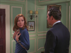 Emma turns her back to Steed and asks him if ‘everything’ has returned to normal