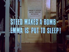 subtitle card: white all caps text with black dropshadow to the left reading 'STEED MAKES A BOMB -
					EMMA IS PUT TO SLEEP!' superimposed on the view between the shelves in the record office