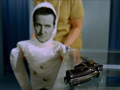 The culmination of Teddy’s conditioning - a dummy with Steed’s face and a revolver