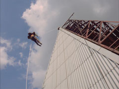 Gillars abseils down a building as he approaches his rendezvous with Paxton