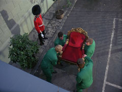 The removalists pack a throne from Buckingham Palace into their van