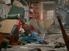 The bomb goes off in ‘Steed’s flat’ and Tara is buried under falling masonry