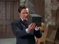 Steed puzzles over the mysterious box